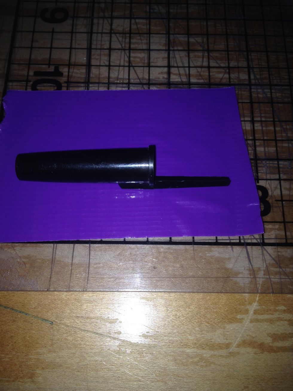 Cut a piece of tape that the top fits