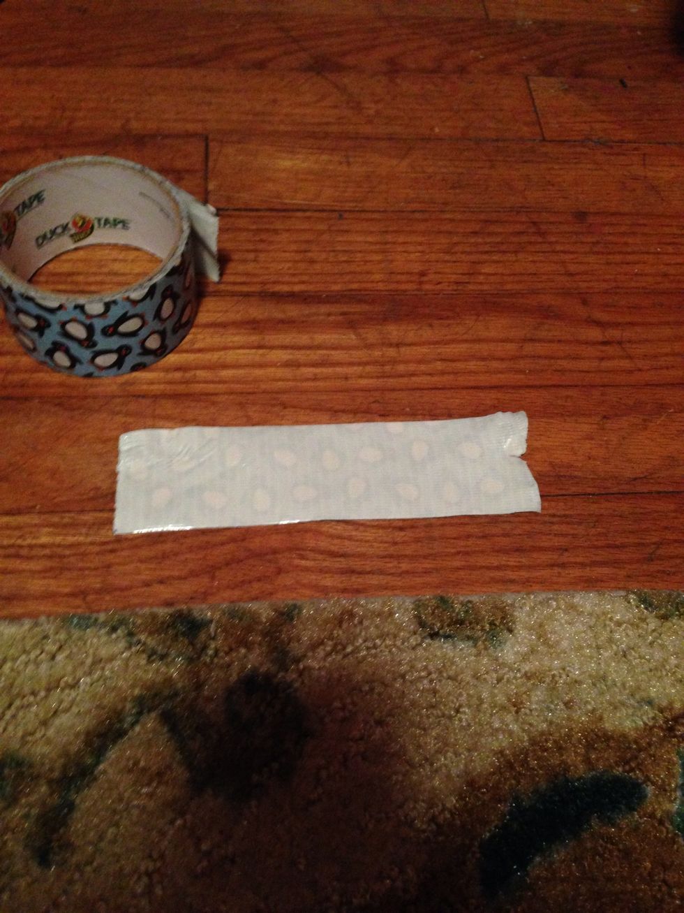 Cut a piece of tape the bigger the bigger the bow so I cut mine small:)