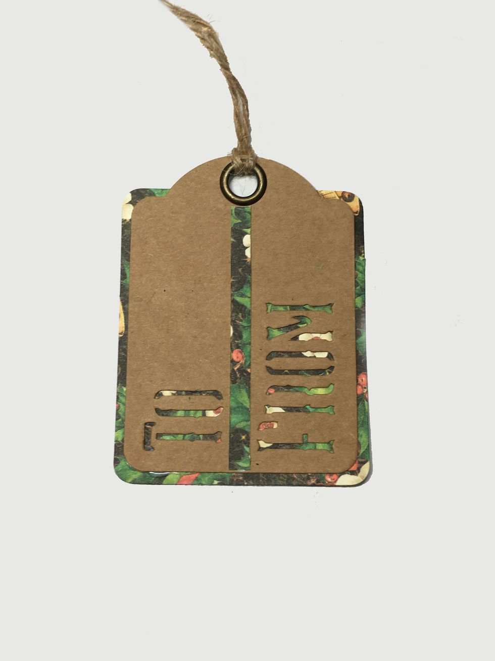 Cut a piece of twine about 9" long and attach to the tag.