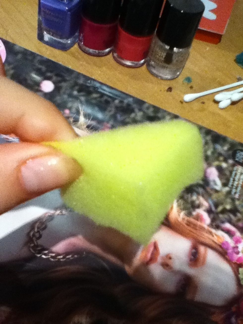 Cut a piece of your sponge into a square the in half so it triangle.