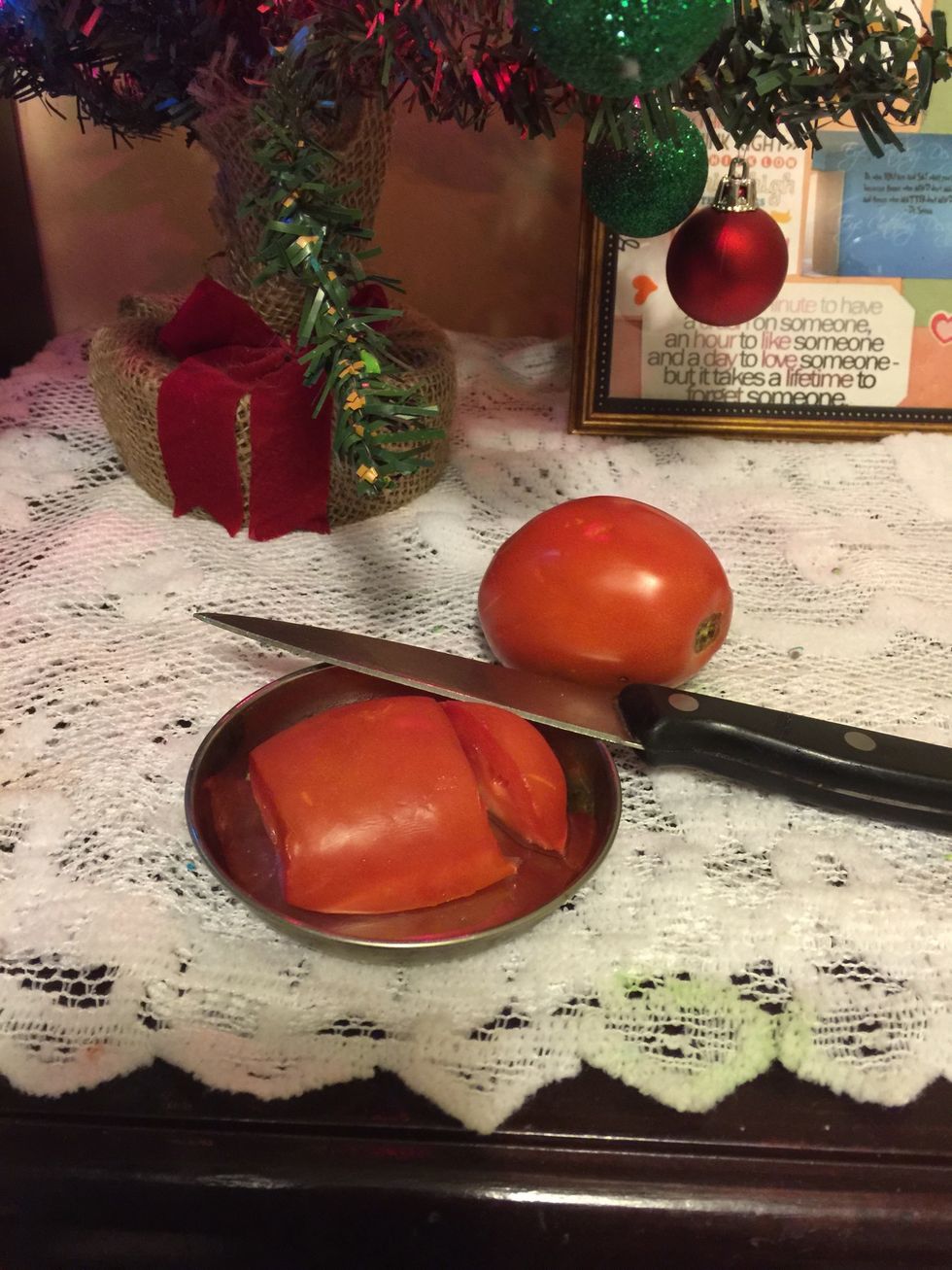 Cut a piece of your tomato.