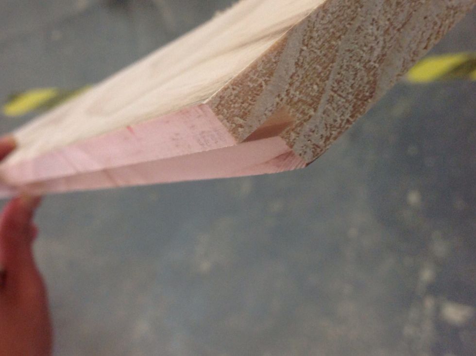 Cut a recess into the wood for the mirror to slot into