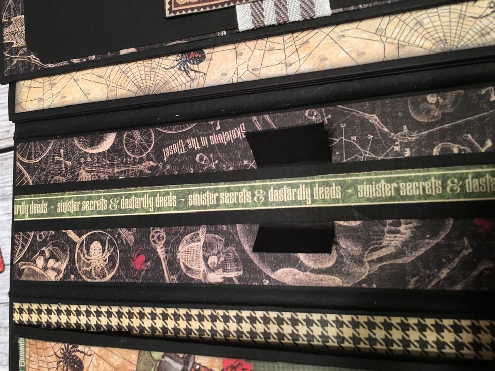 Cut a scrap of card stock and wrap around the center of the strip.