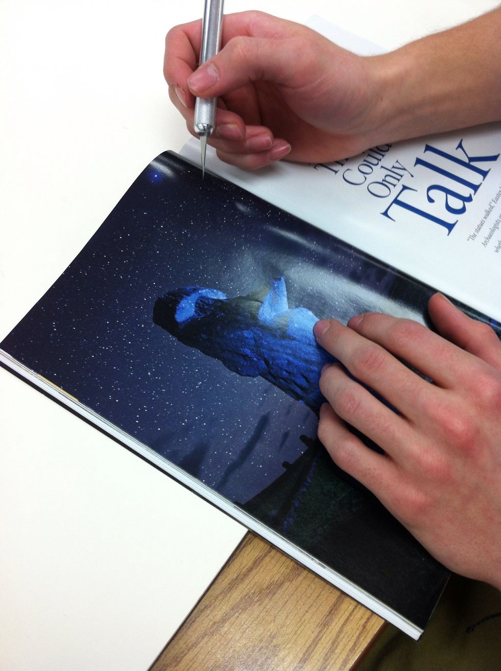 Cut a shape from a magazine.