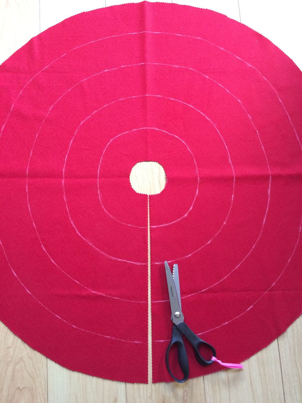 Cut a slit between the two rings