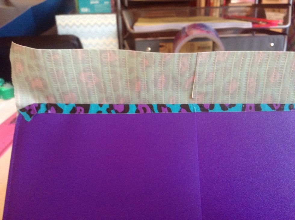 Cut a slit where the pocket is.