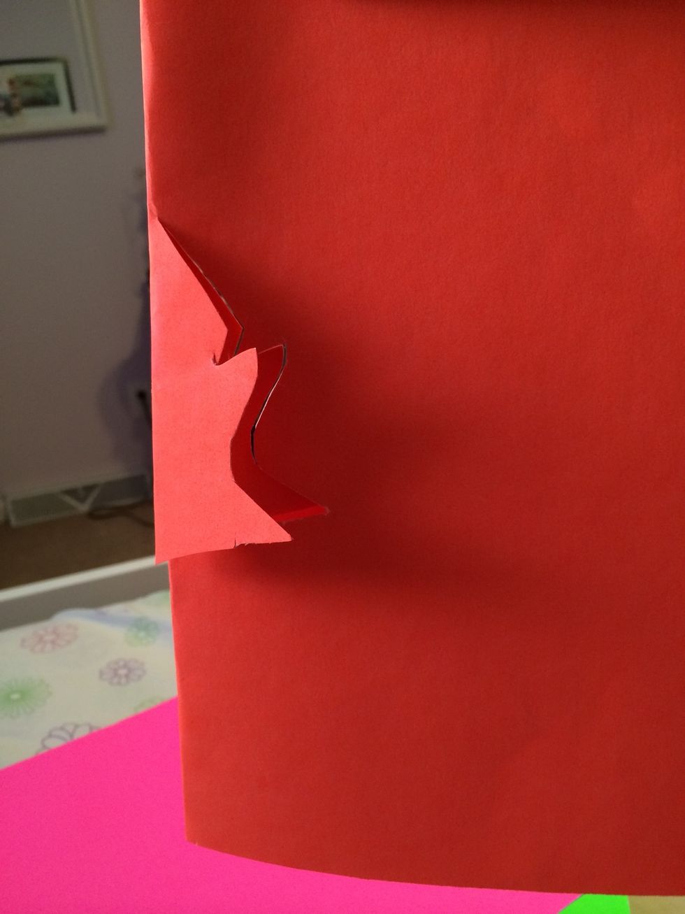 Cut a small design out of the middle. Don't throw it away because you can always use it!