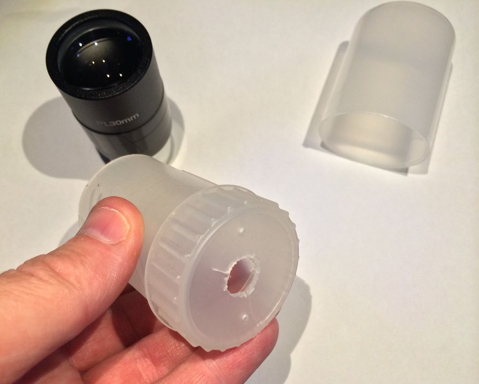 Cut a small hole around 10mm in the centre of the case