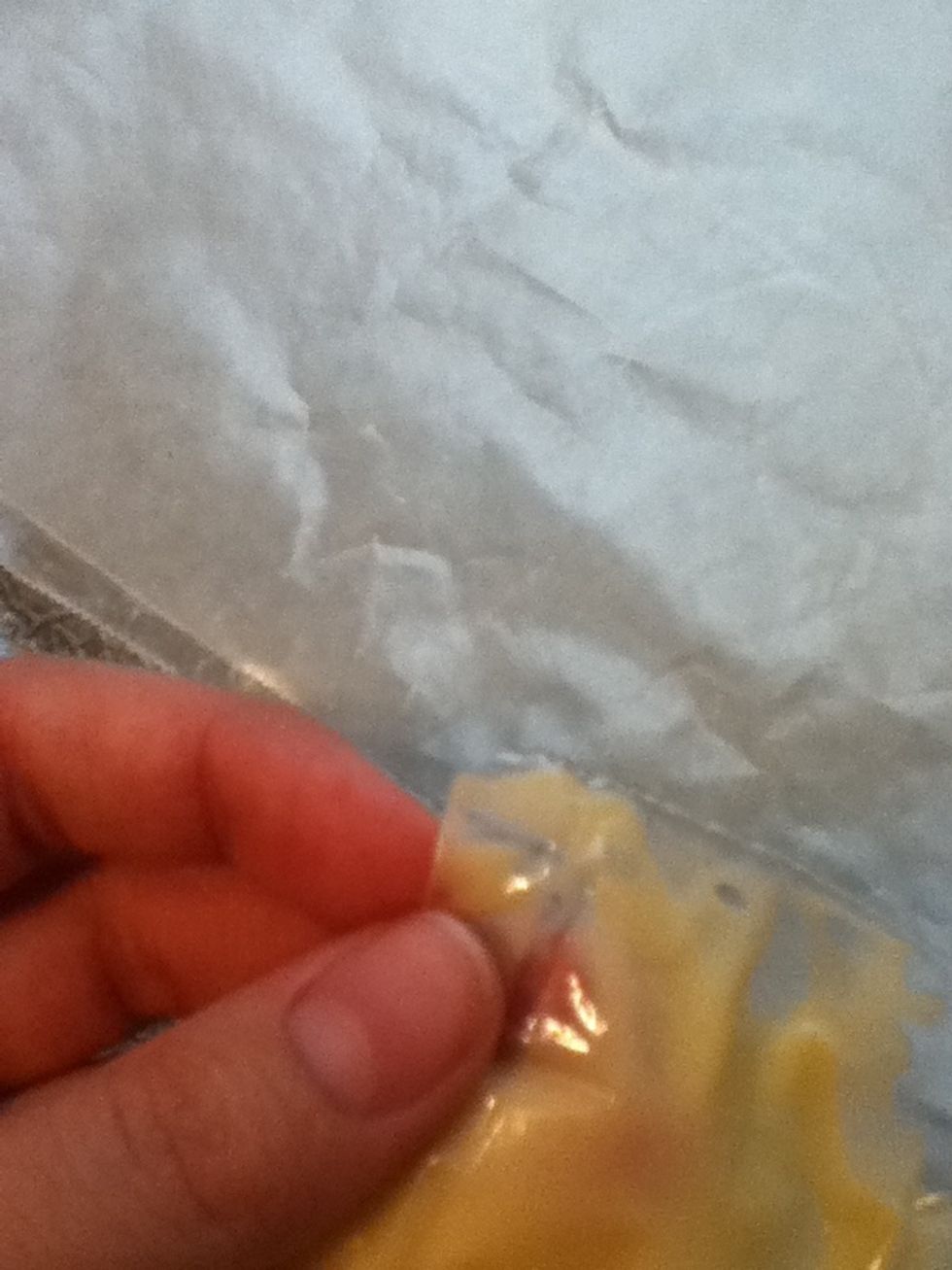Cut a small hole on the corner of the ziploc