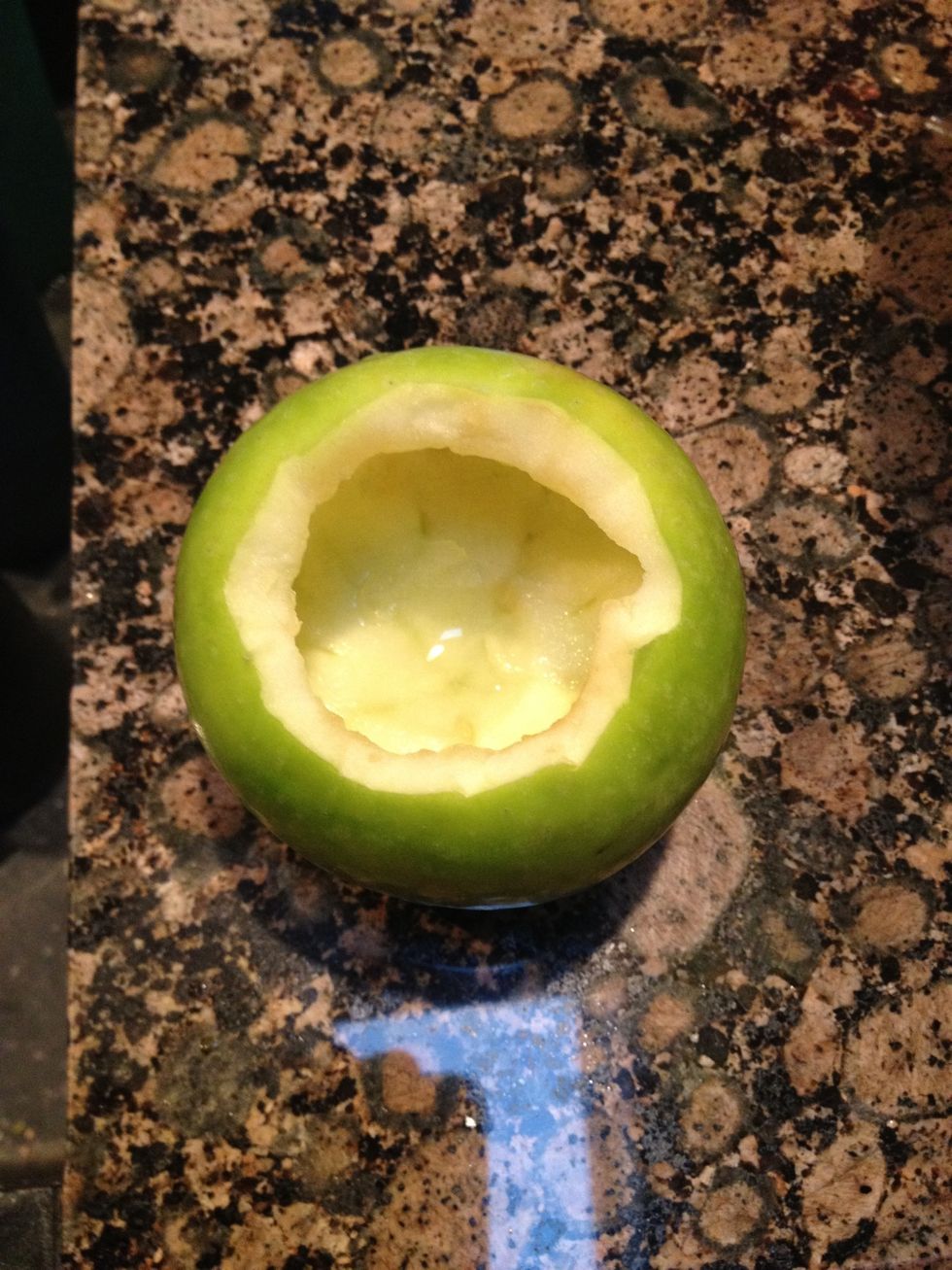 Cut a small rim around the top of the apple and, using a melon baller, remove most of the inside of the apple (reserve removed apple for filling).