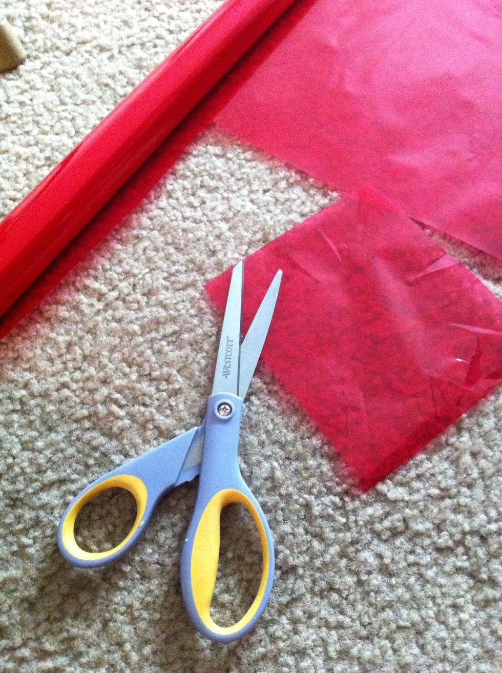 Cut a square piece of cellophane. You can substitute anything for cellophane if you don't have any.