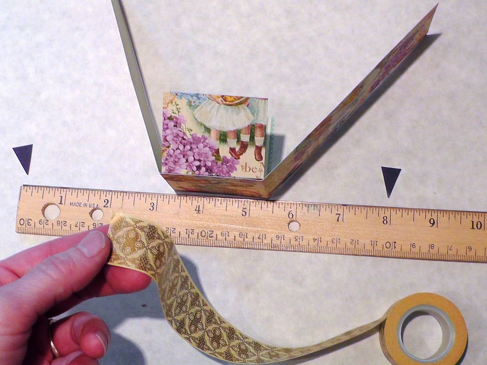 Cut a strip 9 Inches long of Washi Tape