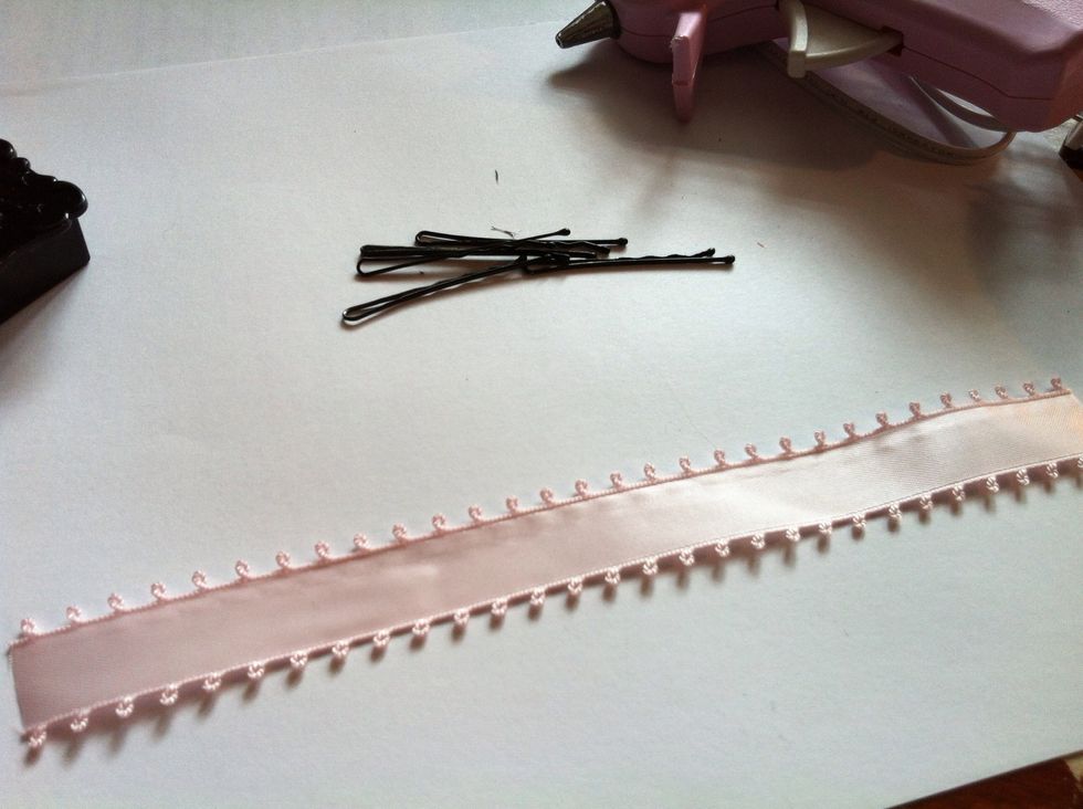 Cut a strip around 20 cm long. Actually depends on you, if you want the ribbon to be bigger then cut a longer one.