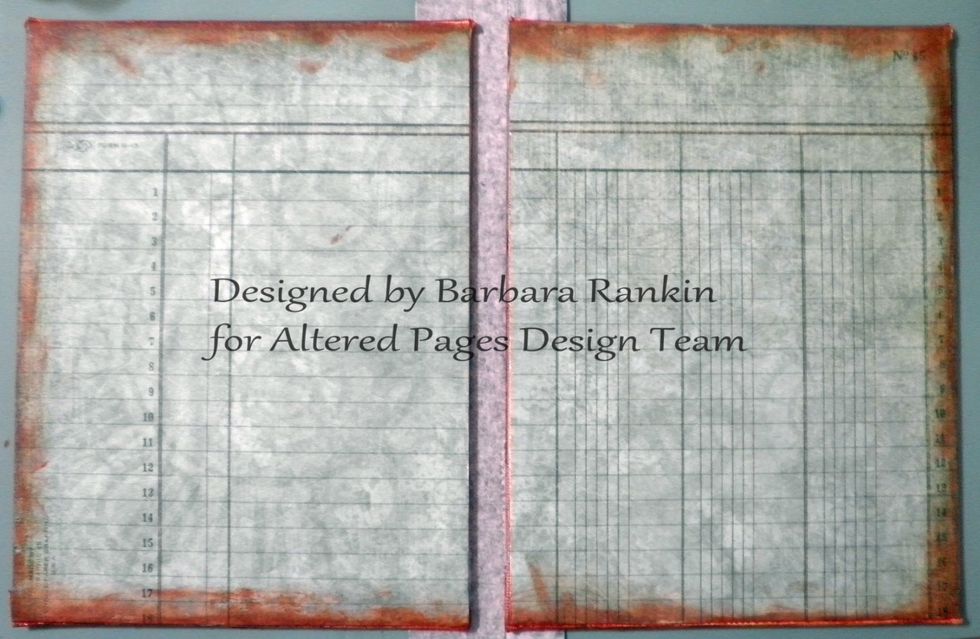 Cut a strip of book cloth 2" wide by 9-1/2" long. On the reverse (paper side), draw pencil lines 3/4" in on each long side. Use these lines to align and adhere your book boards, leaving a gap.