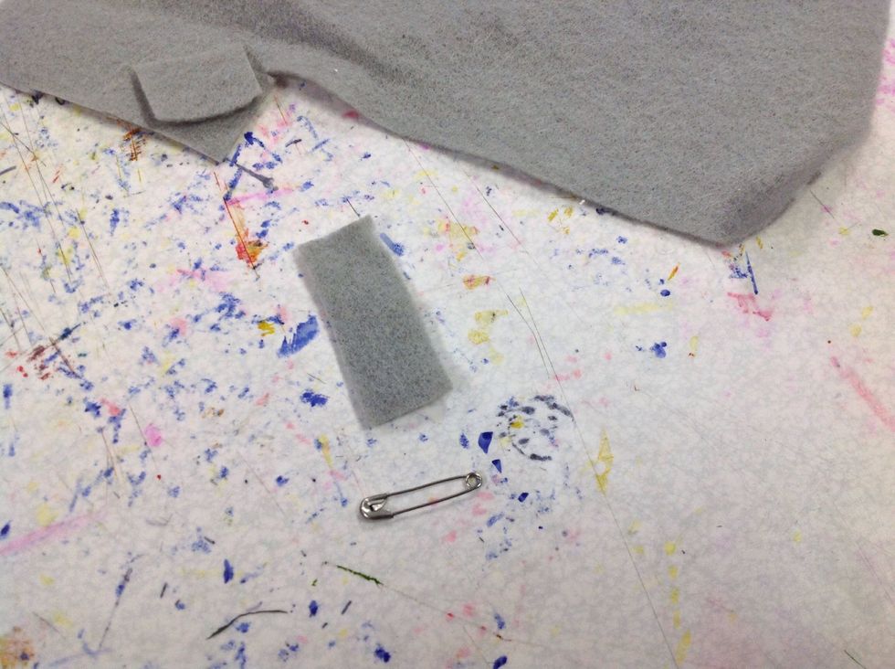 Cut a strip of fabric the width do a close pin.