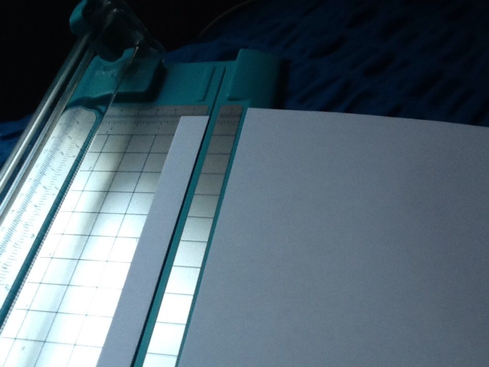 Cut a strip of paper the size depends on how big yoU want your star