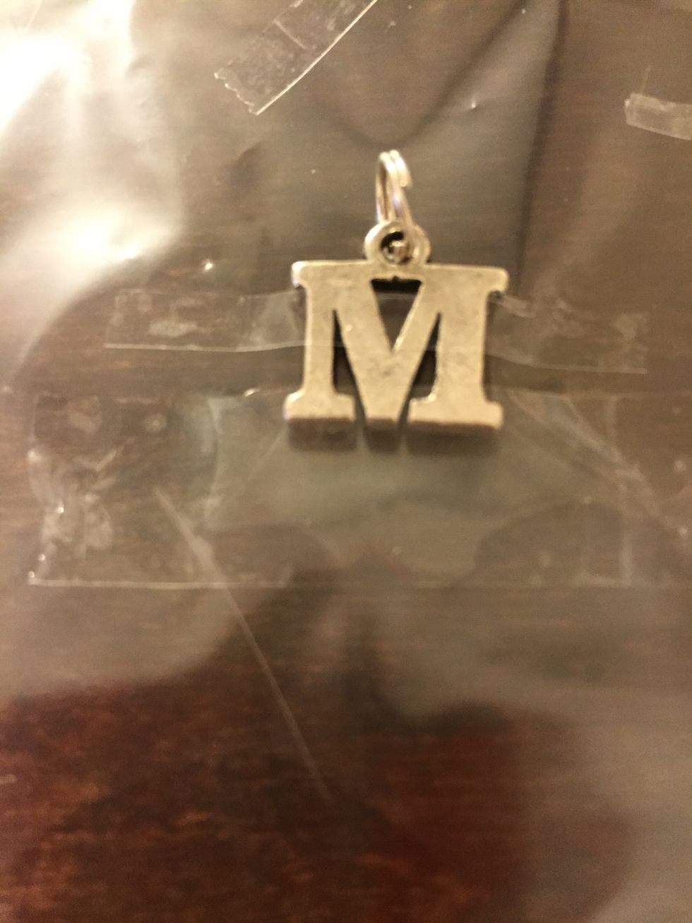 Cut a thin piece of tape and put on near the end/middle.