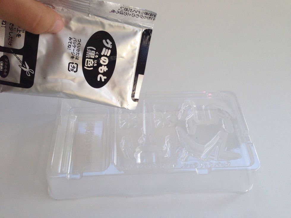 Cut a tiny corner of BLACK Grape Powder Packet- you want it to be tiny so the powder comes out slow and controllable -