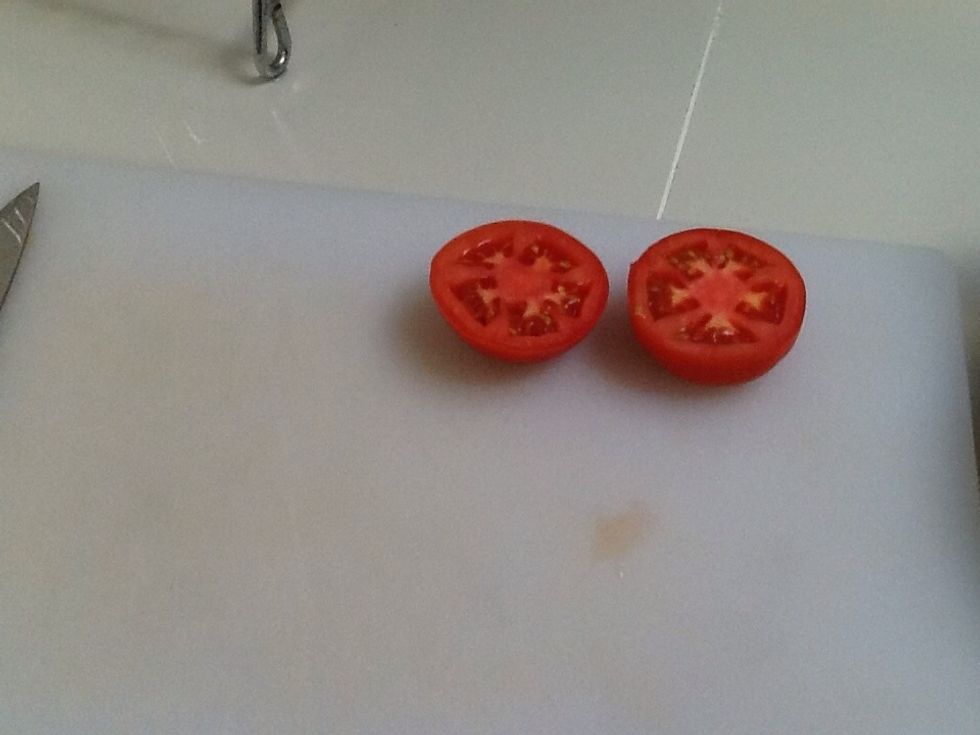 Cut a tomato in two