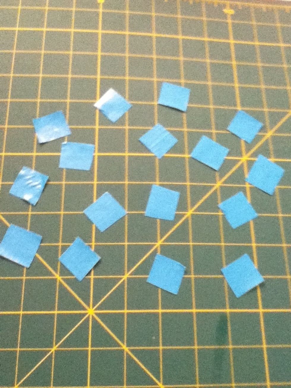 Cut about 15 little inch long squares.