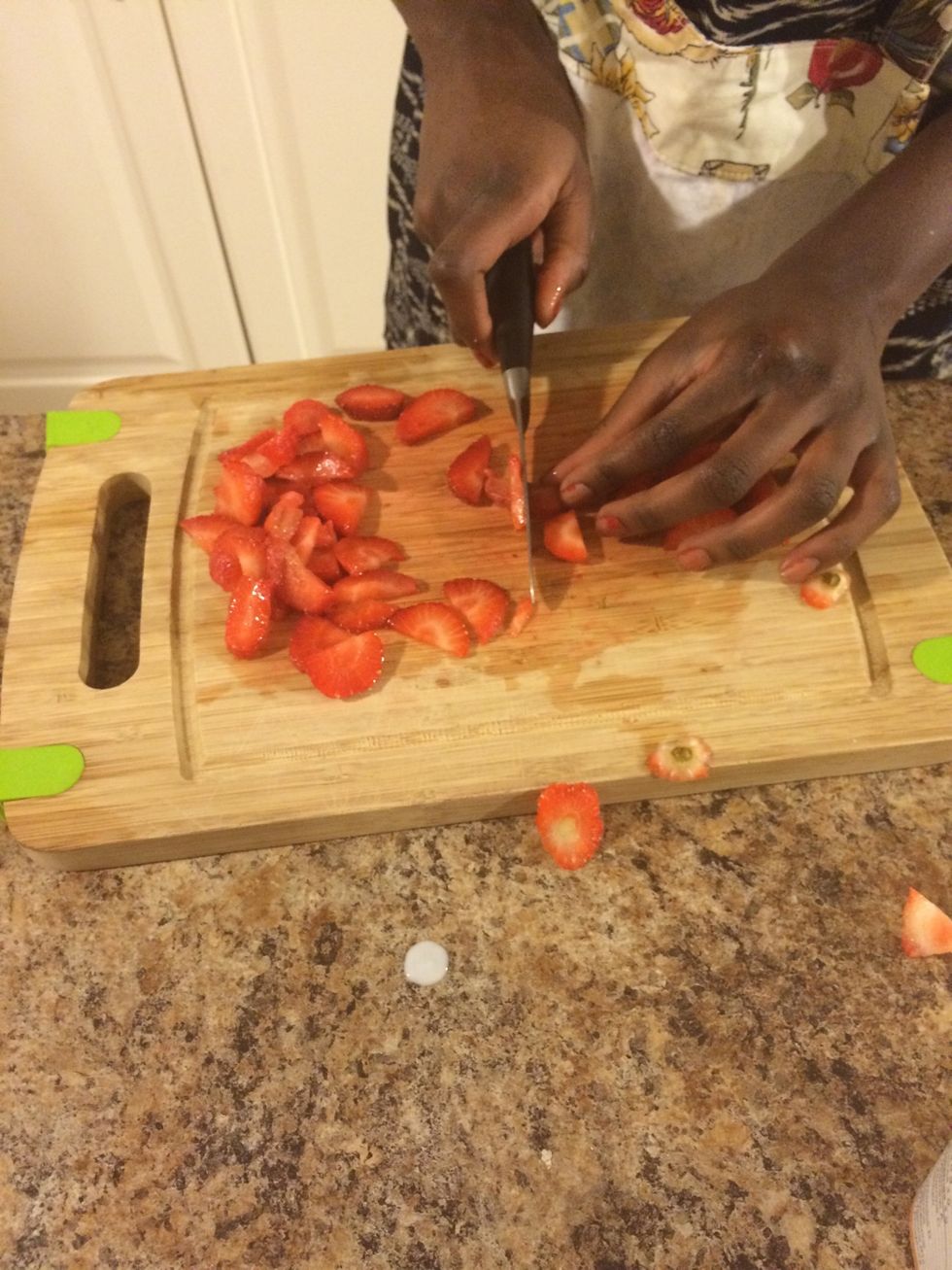 Cut about 5 strawberries into small pieces