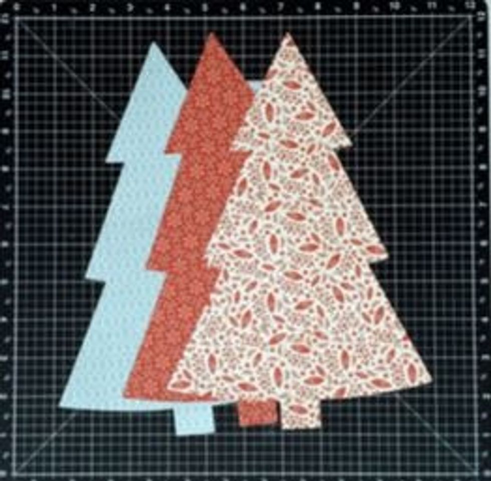 Cut all 3 tree trees into sections at the same time. It will make it easier to piece the trees back together because the cuts will all line up the same between the sections. You can mix and match.
