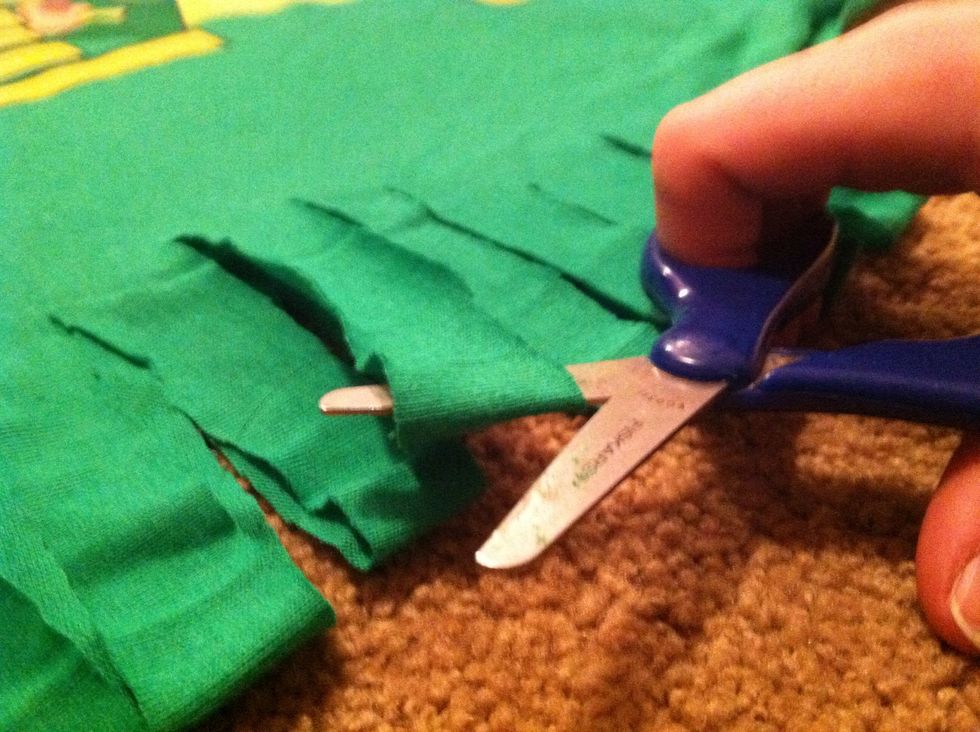 Cut all on the fringed loops at the seam