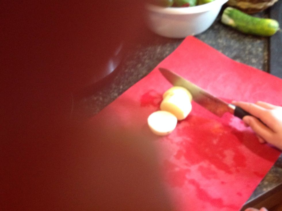 Cut all the potatoes in threes or fours.