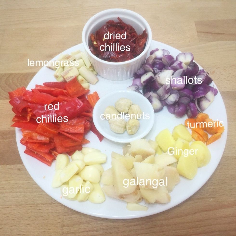 Cut all the spice ingredients to prepare for blending or pounding into paste.