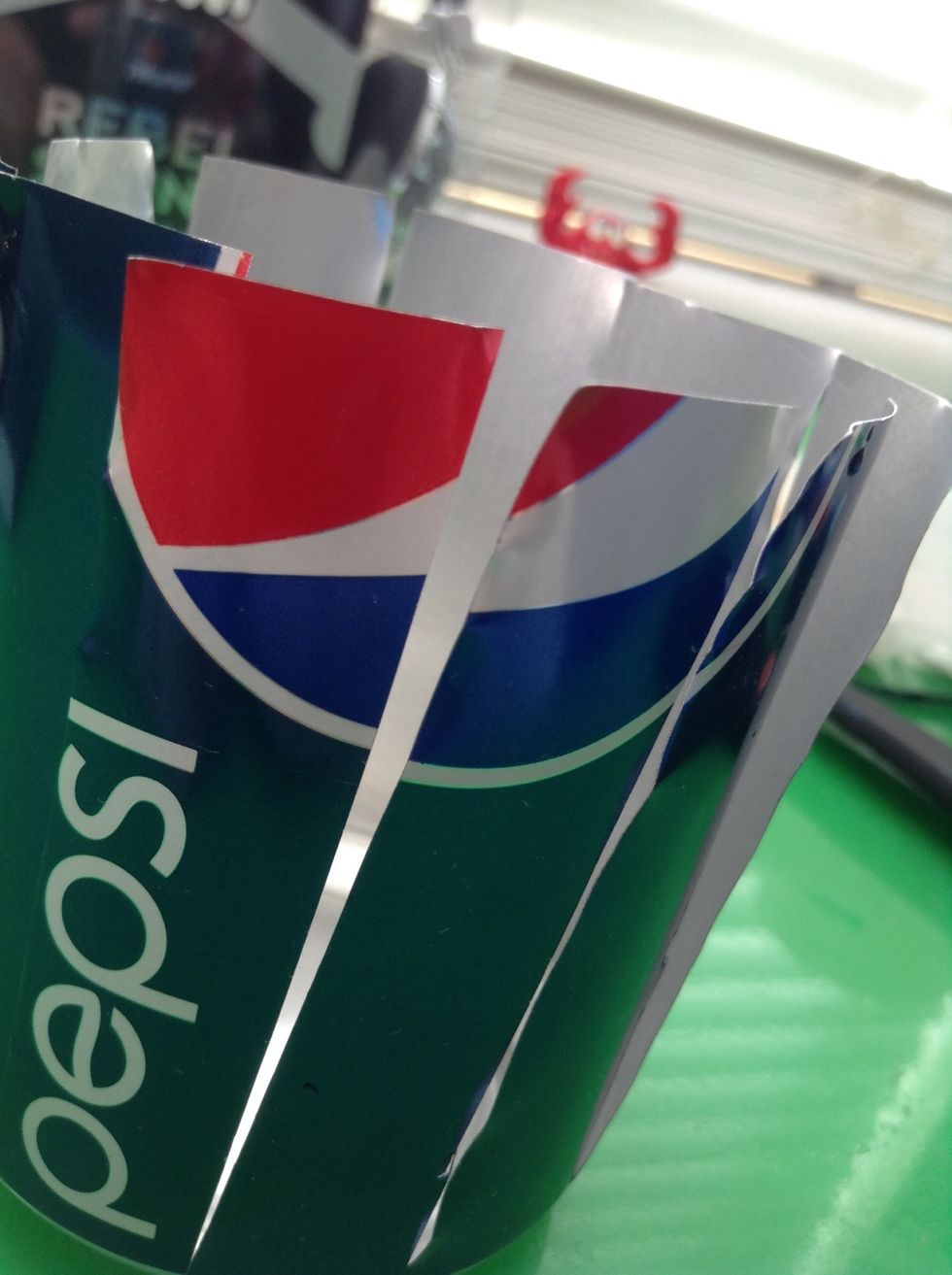 Cut all the way around the can the same width as the first one