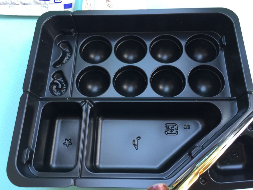 Cut along the lines of the tray to separate each 5 sections