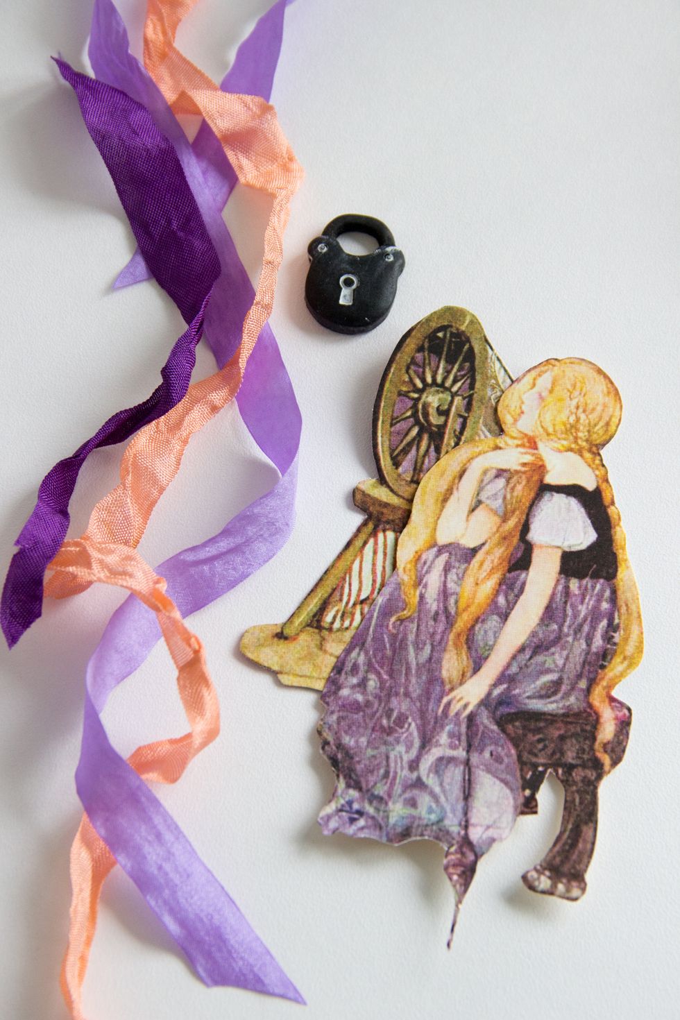 Cut amazing princess from Graphic 45 An Eerie Tale You Bewitch Me paper. Select a ribbons JUST violet, lavander and coral or yellow colors! (like a girl`s hair and her dress)