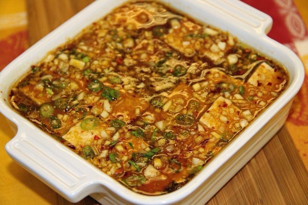 Cut an 8 ounce block of tofu into cubes and pour the marinade over.