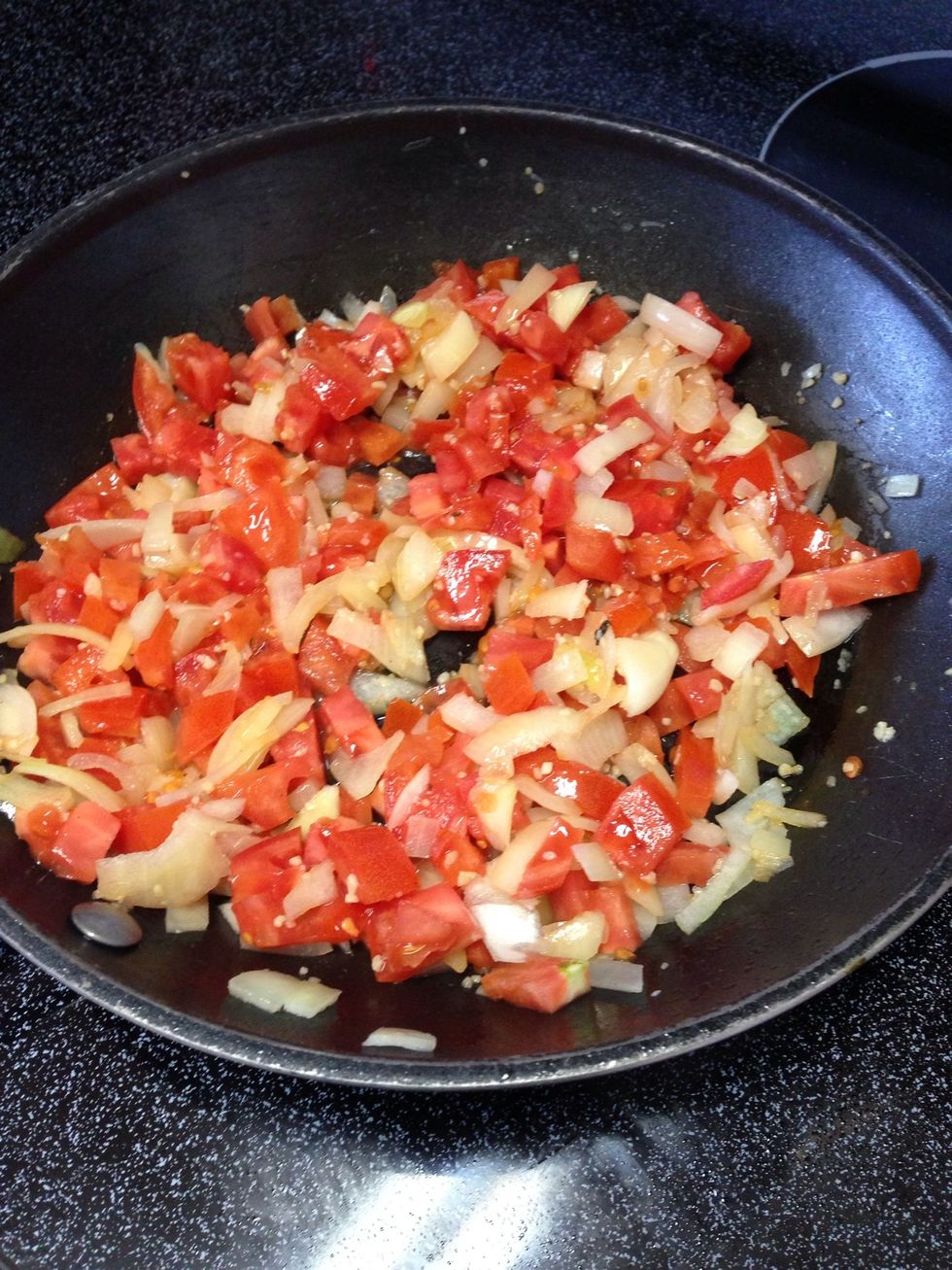 Cut and add tomatoes. Mix well. Heat for another 10 minutes on low.