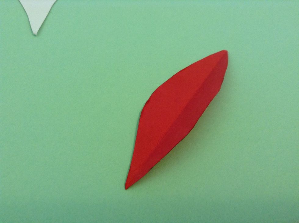 Cut and fold a symmetrical petal like this.