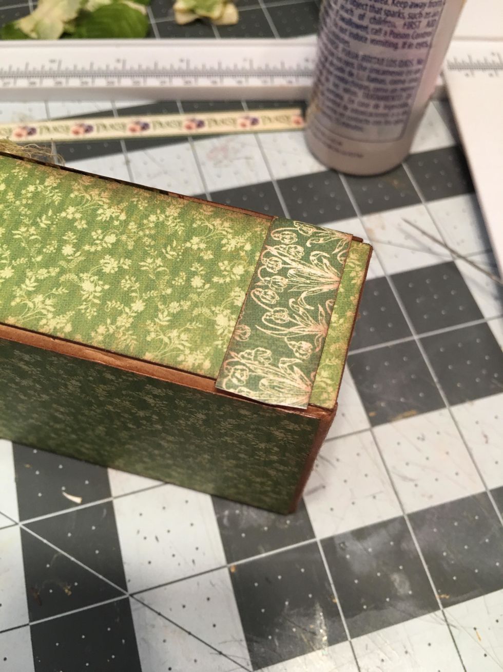 Cut and ink a small piece of scrap paper for each side of the lid. Cut to fit and glue into place (see next photo).