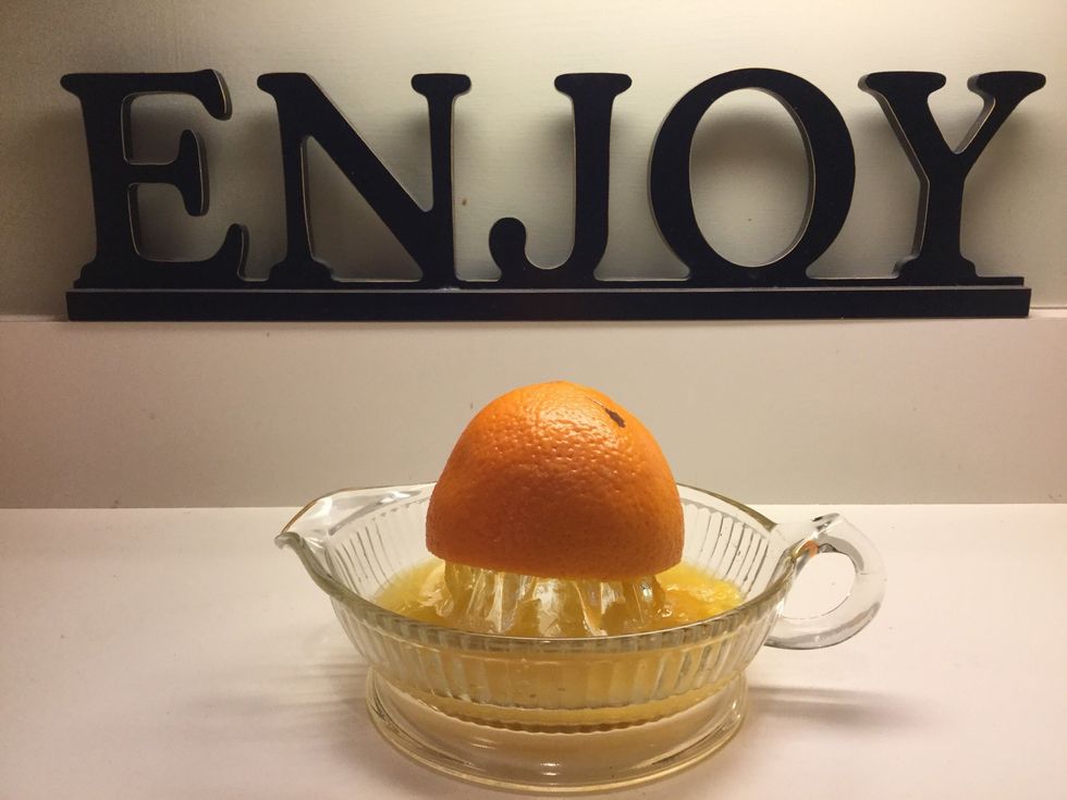 Cut and squeezed oranges until you have at least a 1/2 cup of juice