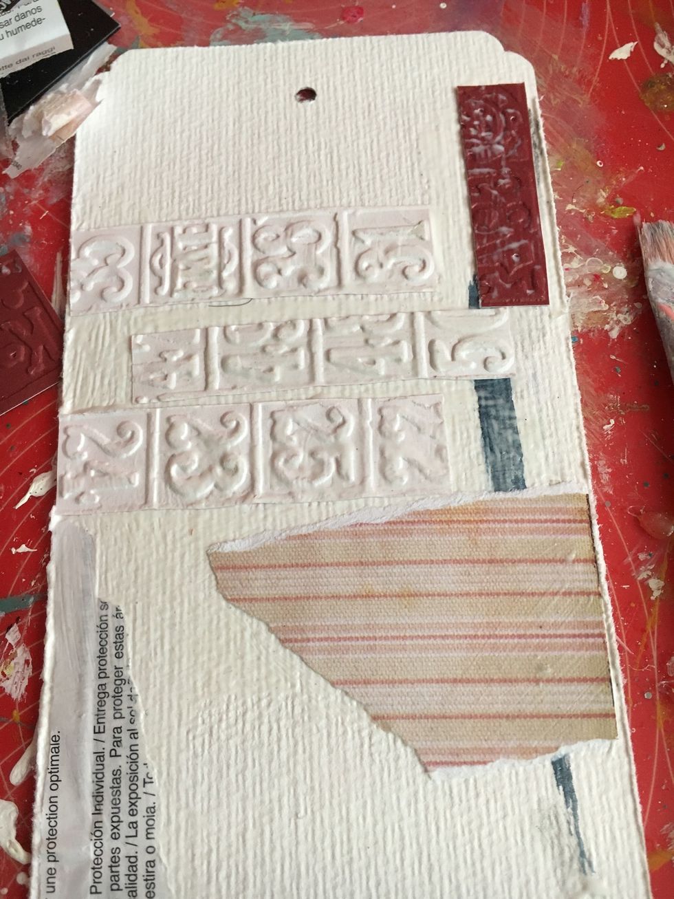 Cut and used a Mod Podge for assembling your background and cover it with a white gesso