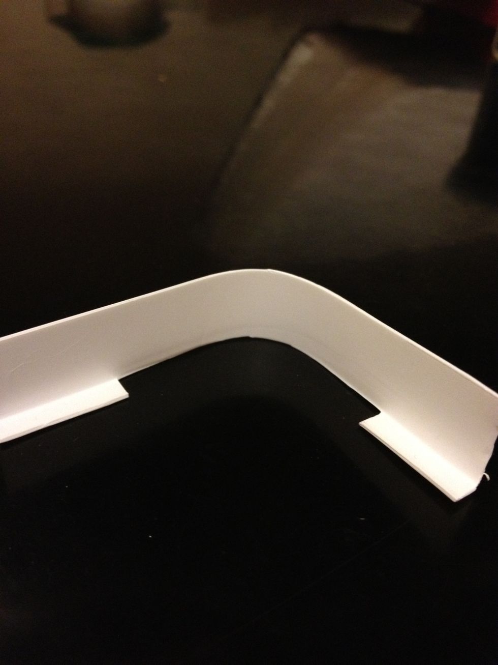 Cut another corner strip from iPad box. Main purpose: to make a holder that will wrap around the phone corner nicely.