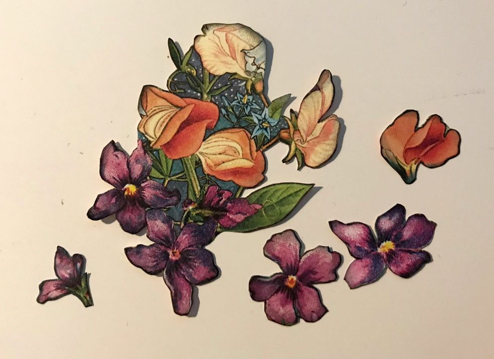 Cut another flower bunch along with four smaller flowers out of the floral paper. Ink the edges of the flowers using Photogenic Ink and a blending tool.