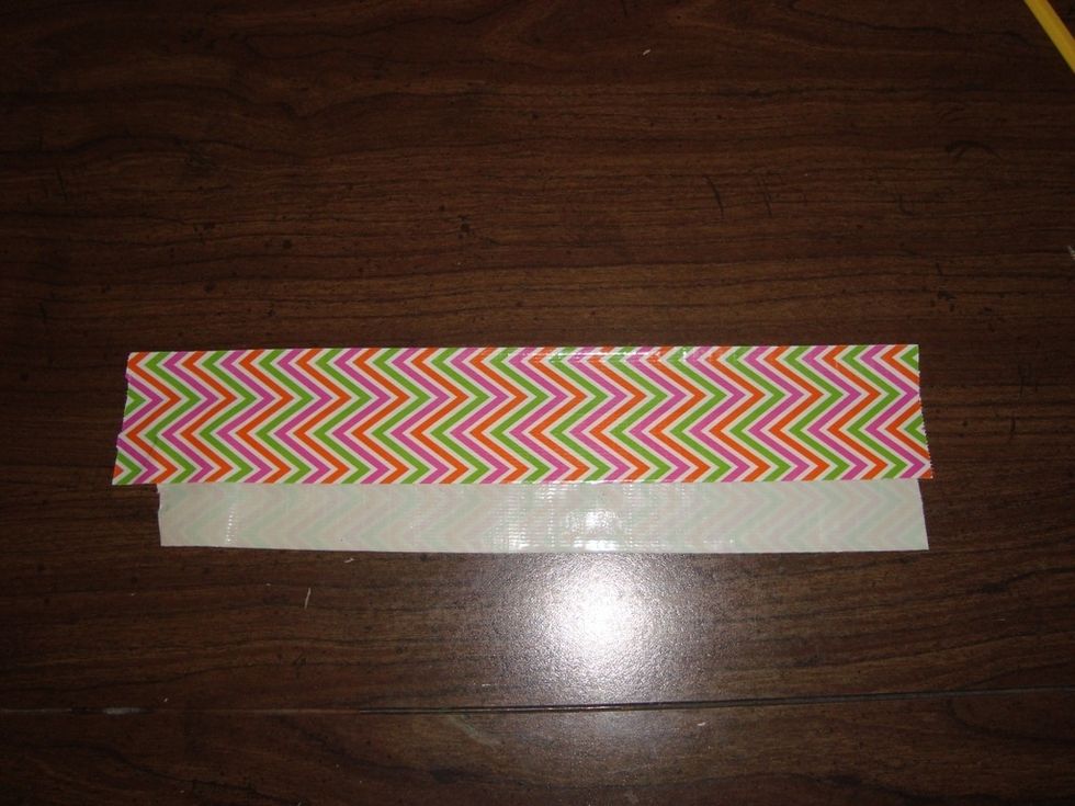 Cut another piece, and put it, sticky side down, halfway down the first piece!