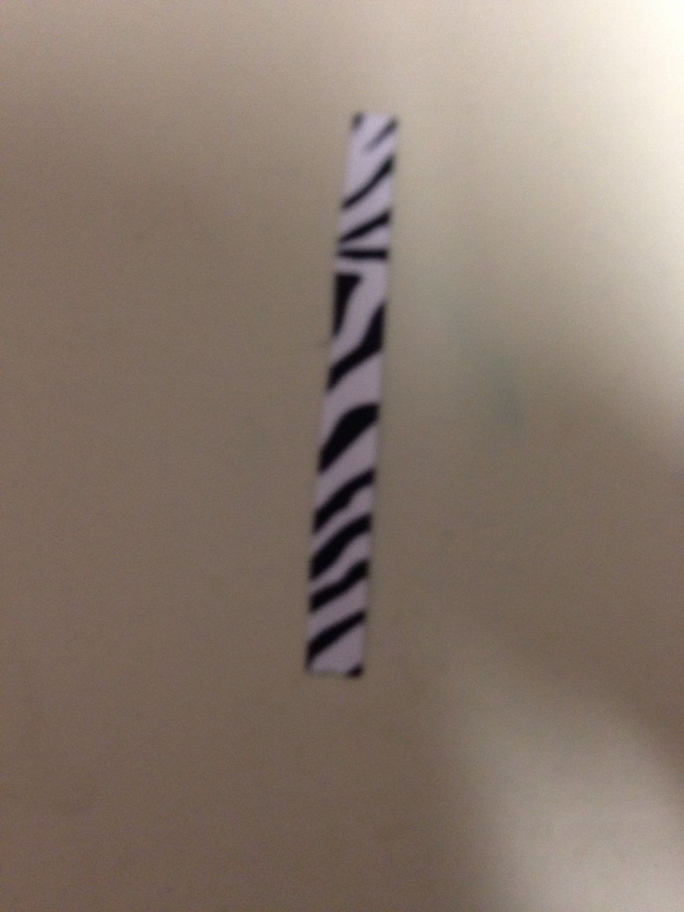 Cut another piece of 3/8 inch ribbon from the 5 inch ribbon. Heat seal