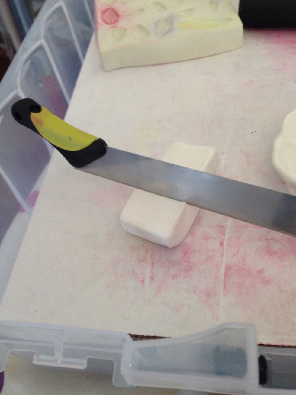 Cut another piece of clay (same colour) with available knife.