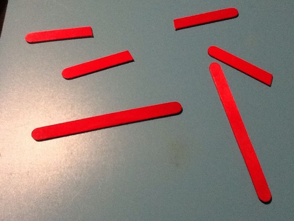 Cut another stick in half now your table or area should look like this
