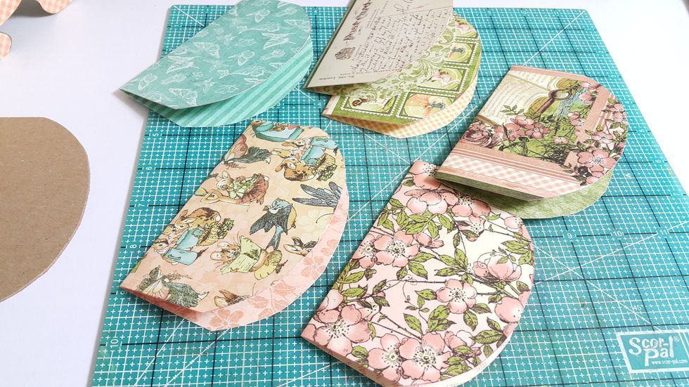 Cut another two sets of pages, one set using 6-1/2" x 5" papers, and one set using 4-1/2" x 5"