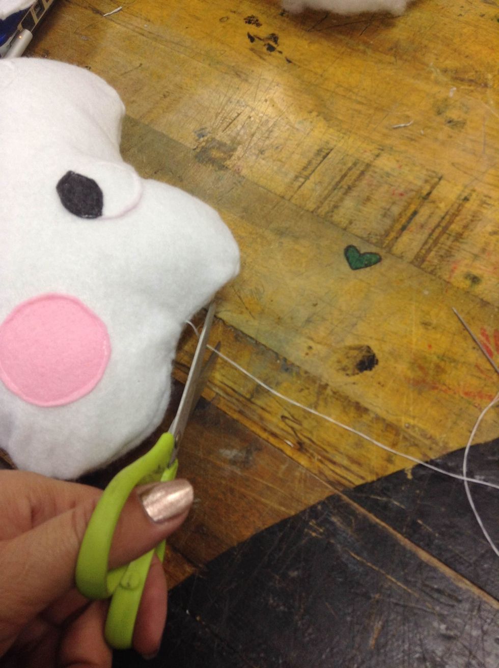 Cut any leftover threads