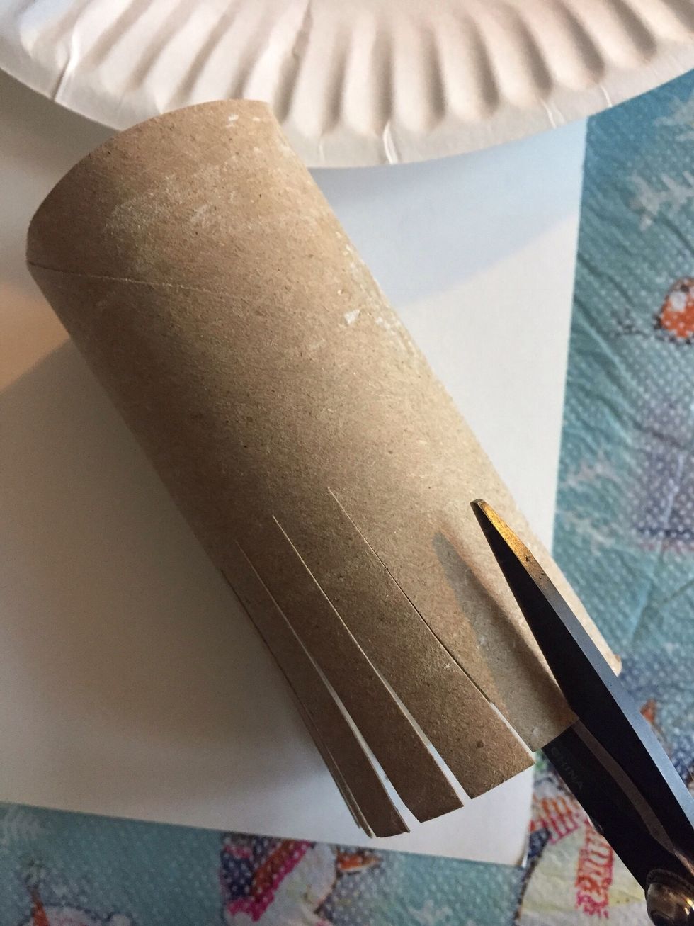 Cut approx 2 inch long slices along one edge of roll.  About an 1/8 inch apart