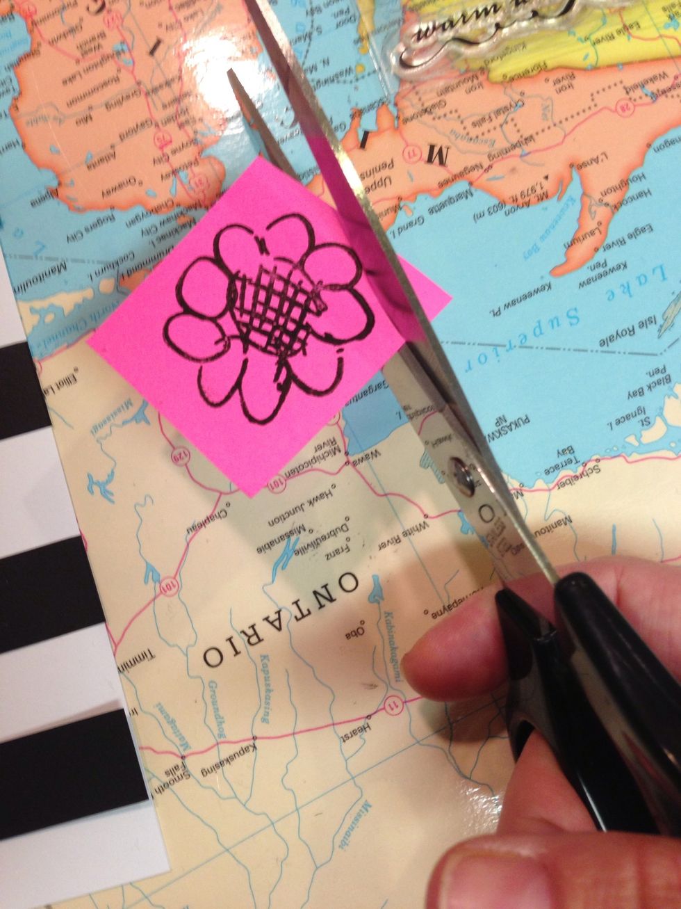 Cut around the flower leaving a small edge outside of the lines.