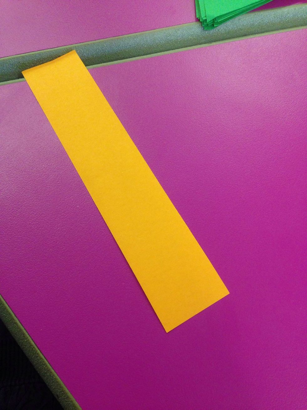 Cut at least 6 strips of paper.