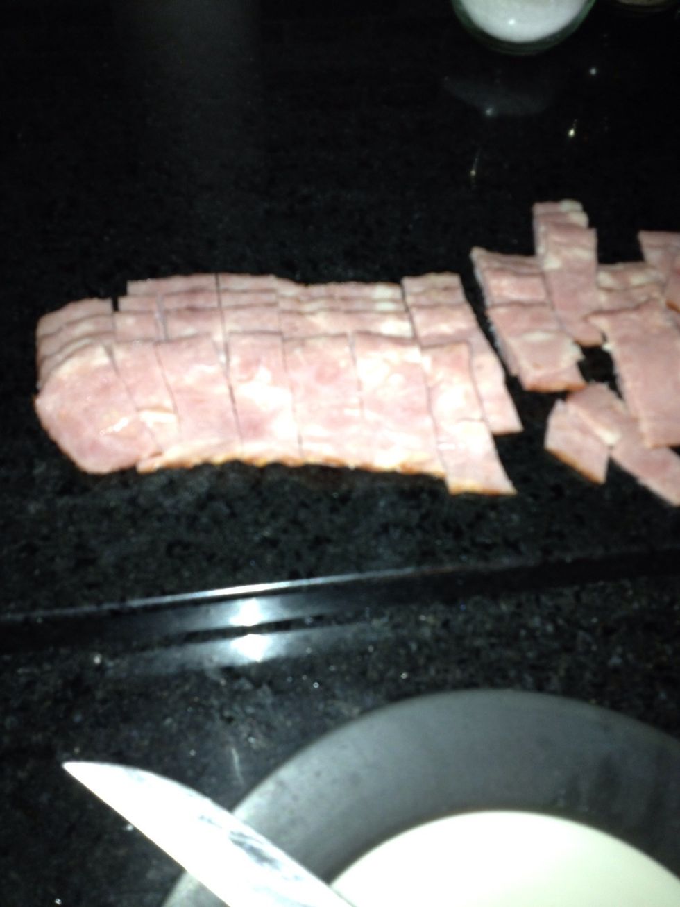 Cut bacon and any other ingredients you would like to add into pieces.